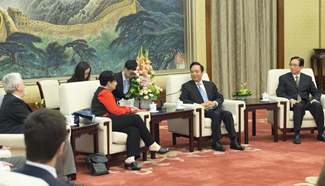 Li Jianguo meets foreign reps attending G20 labour meeting