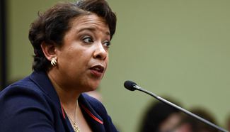 U.S. attorney general defends decision on Clinton email probe