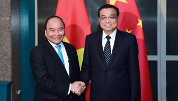 China sticks to two-way talks by relevant parties in solving South 
China Sea disputes