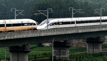 Chinese bullet trains cross in world first