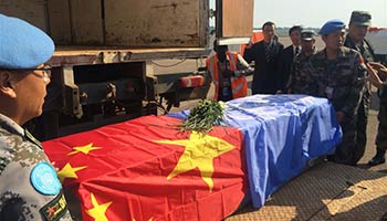 Coffin of Chinese UN peacekeeper arrives in Uganda