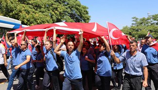 People protest against coup outside parliament building in Ankara