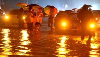 Torrential rain hits C China's city, causing serious waterlogging