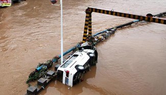 14 dead, 72 missing in heavy rain in China's Hebei