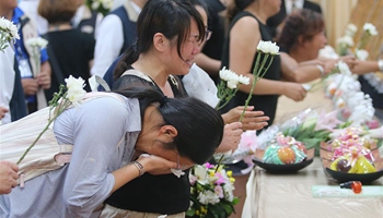 Families of tour-bus accident victims mourn in Taoyuan, SE China's Taiwan