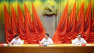 Symposium for qualified scientists and technicians closes in Beijing