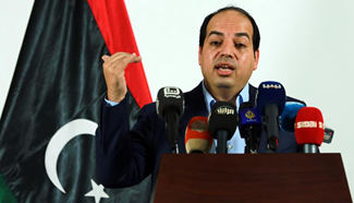 Libyan deputy PM speaks during press conference in Tripoli