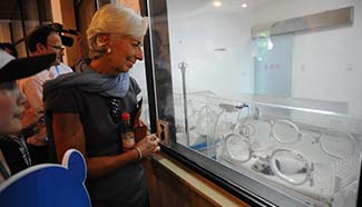 Lagarde visits Chengdu Research Base of Giant Panda Breeding