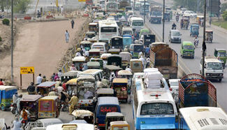 In pics: traffic jam on busy road in Pakistan's Lahore