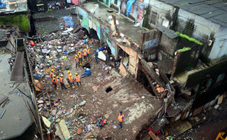 At least 9 killed, 10 injured after building collapses near Mumbai