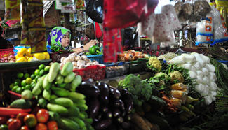 Indonesia's annual inflation eases to 3.21 pct in July