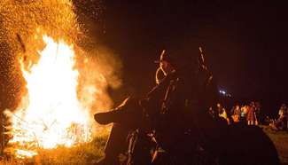 People light bonfire to mark National Day in Switzerland