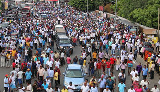 Supporters of former Sri Lankan president rally against incumbent government