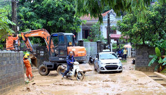 Tornado, heavy rain triggered by Typhoon Nida kill 2 in northern Vietnam