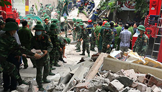 Building collapse in Vietnam's capital Hanoi kills 2, injures several