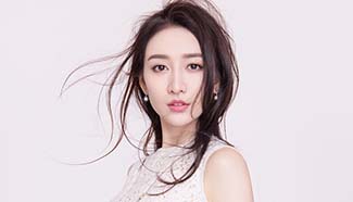 Wang Ou graces fashion magazine