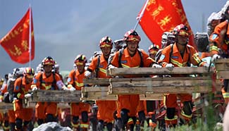 Firemen attend quake rescue drill in Qinghai