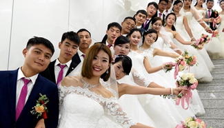 Group wedding ceremony held on Chinese Valentine's Day