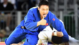 Cheng Xunzhao beats Sweden's Nyman to advance to men's judo 90KG semifinal