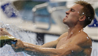 Dmitriy Balandin wins gold in men's 200m breaststroke final of swimming