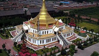 People visit Myanmar style shrine in C China's Henan