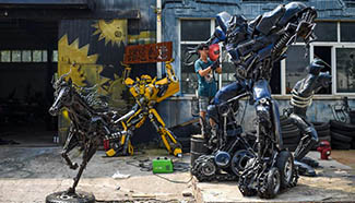 "Transformers" made to express environmental awareness in Tianjin