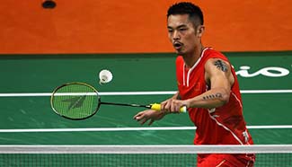 Lin Dan beats Nguyen Tien Minh 2-0 during men's singles group match of Badminton