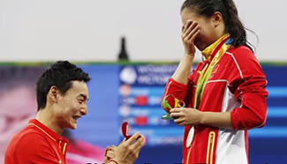 He Zi of China receives marriage proposal from Chinese diver Qin Kai