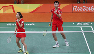 China's Xu Chen, Ma Jin win 2-1 during mixed doubles group play stage match of badminton