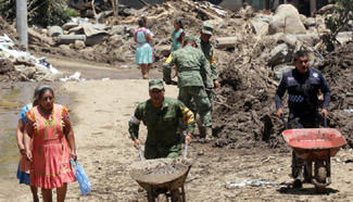 Death toll of mudslides by Earl's strong rains rises to 52 in Mexico