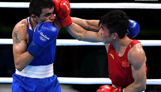 Hu Jianguan beats Narek in men's fly(52KG) preliminary of Boxing