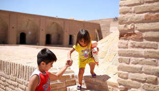 People visit historical Caravanserai in Iran