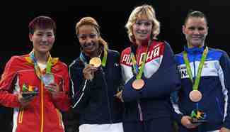 China's Yin Junhua wins silver medal of women's light(57-60KG) final of boxing