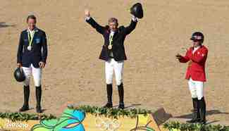Britain's Nick Skelton wins gold medal of jumping individual final of Equestrian