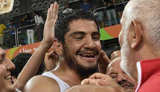 Wrestling world champions Akgul, Sadulaev bag Olympic titles