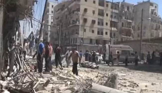 Syria gov't hits Kurd-held area for first time