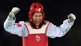 China's Zheng Shuyin wins gold medal of women's +67kg taekwondo