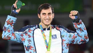 Azerbaijan's Radik Isaev wins men's +80kg taekwondo gold