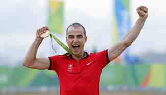 Switzerland's Nino Schurter wins gold medal of men's cross-country race of Cycling Mountain Bike