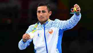 Uzbekistan's Fazliddin Gaibnazarov claims gold in men's light welter (64kg) of Boxing