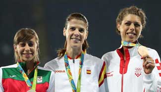 Spain's Beitia wins Olympic high jump gold at 37