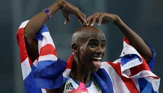 Britain's Mohamed Farah wins men's 5000m gold medal