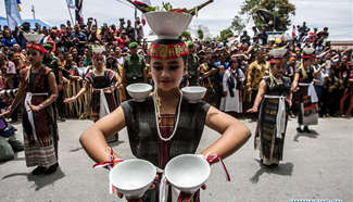 People participate in cultural parade to celebrate Indonesian Independence Day