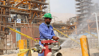 Iranian staff members work at South Pars gas field