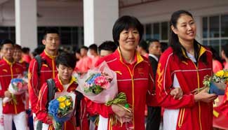 Chinese Olympic delegates arrive in Macao