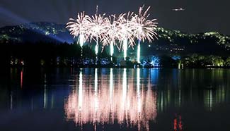 Fireworks light up West Lake in Hangzhou