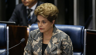 Brazil's Rousseff denounces attempted "coup" at impeachment hearing