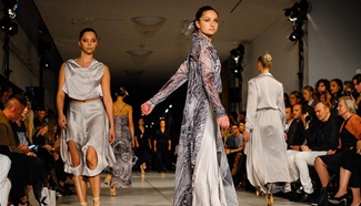 Models present creations by Ida Klamborn during Stockholm Fashion Week