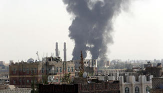 Smoke rises after airstrike in Sanaa, Yemen