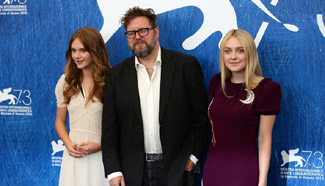 Cast members of film "Brimstone"pose for photocall in Venice